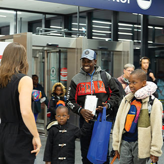 Family meeting another person at an airport. Links to Donor-Advised Funds Family meeting another person at an airport. Links to Donor-Advised Funds